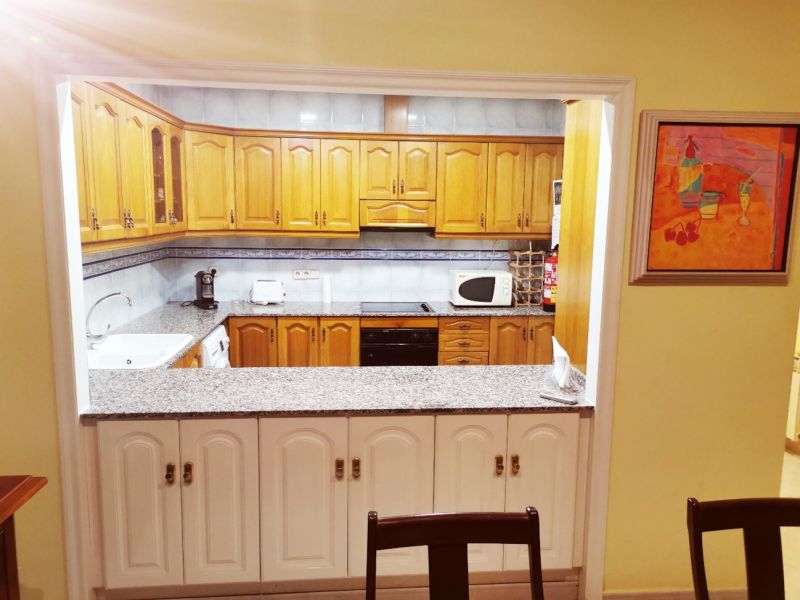 View of the kitchen of a rented flat in Sitges